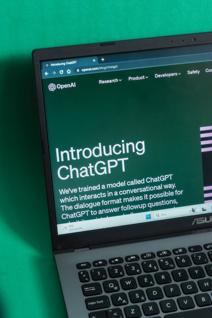 about-us Laptop screen displaying the introductory page of ChatGPT on OpenAI's website.